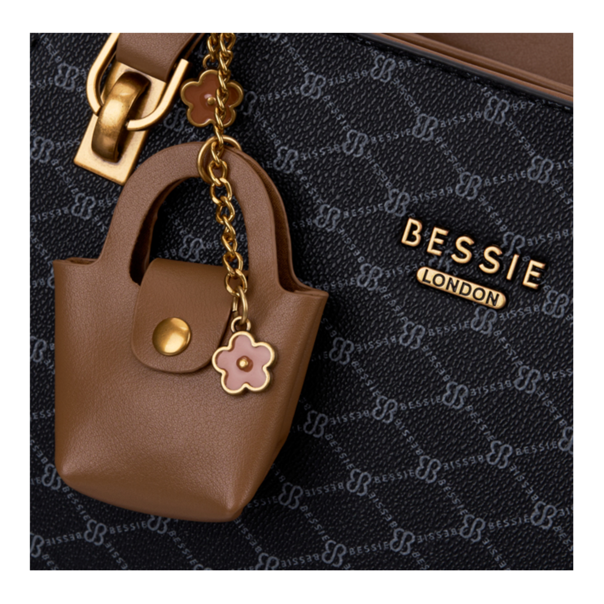 Black sculpted monogram tote bag, close-up of the mini bag charm and monogram print