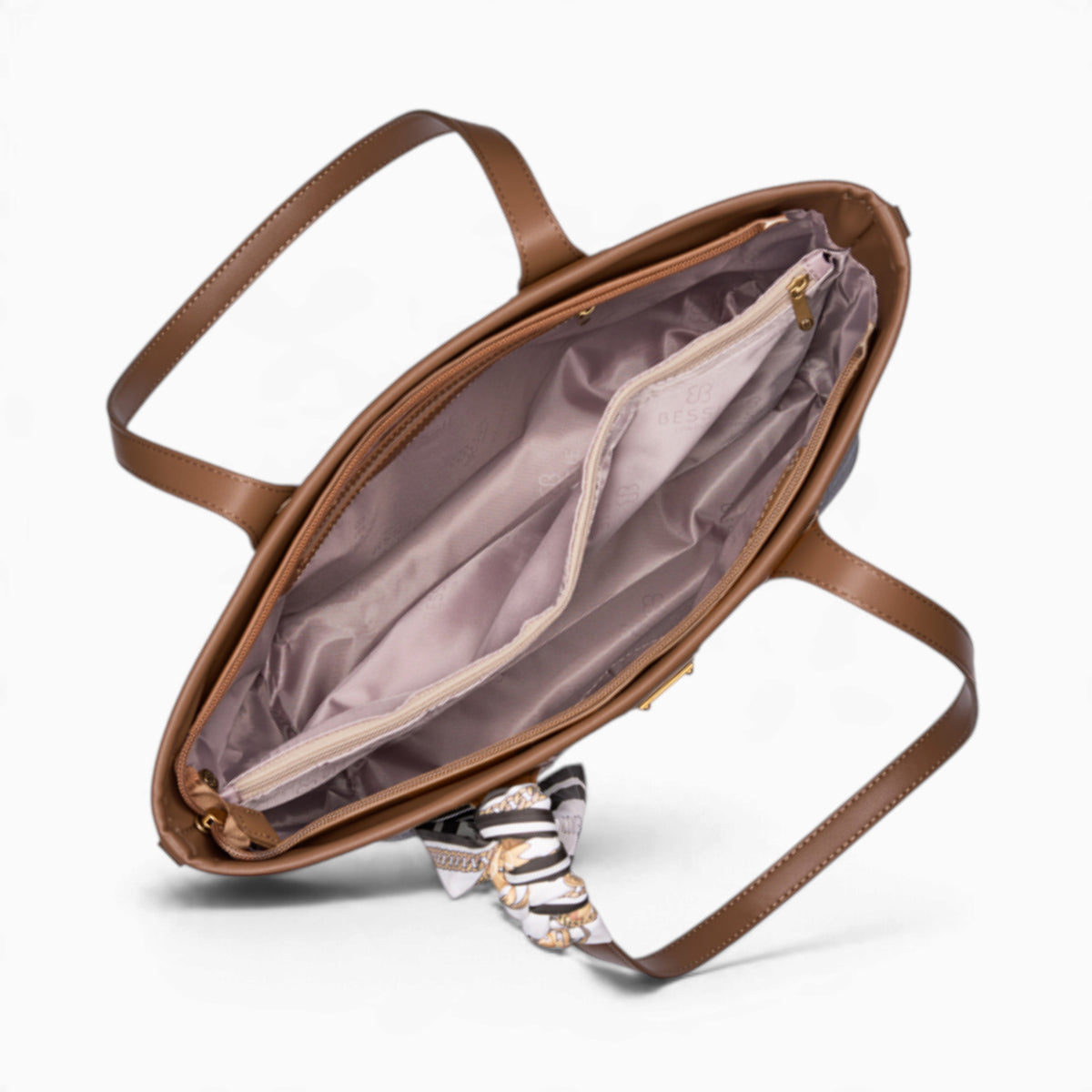 Coffee monogram shopper bag opened to show the zipped divider compartment
