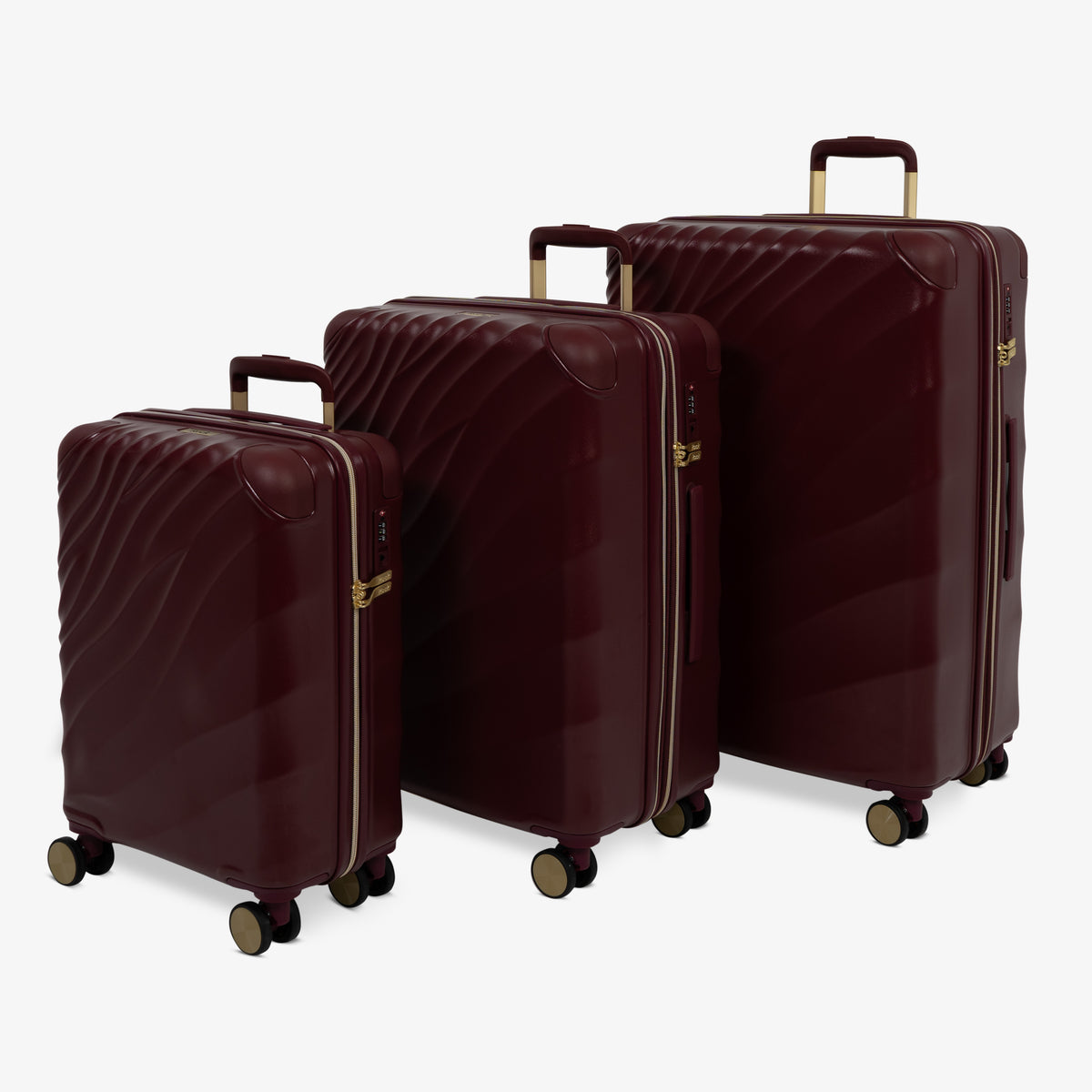 Burgundy Dusk Sahara suitcase set: cabin, medium and large cases standing together