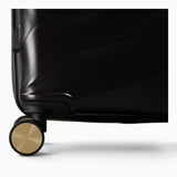 Moonlight Black Sahara suitcase, close-up of the 8 double spinner wheels