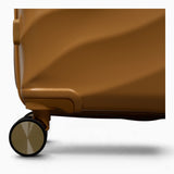 Gold Sunset Sahara suitcase, close-up of the 8 double spinner wheels