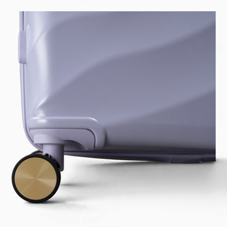 Lilac Sunrise Sahara suitcase, close-up of the 8 double spinner wheels