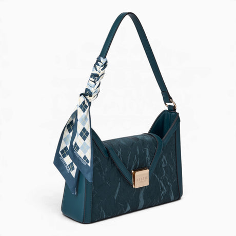 Blue velvet-effect underarm crossbody bag, angled view showing the flap top and scarf