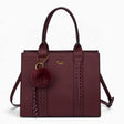 Wine pebble textured tote bag with a pom-pom charm