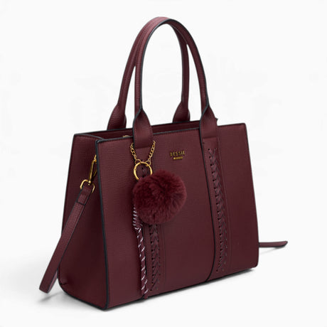 Wine pebble textured tote bag, angled view showing the pebble texture and charm