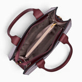 Wine pebble textured tote bag opened to show the zipped divider and middle sections
