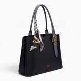 Black minimalist everyday tote bag, angled view showing the structured shape and scarf