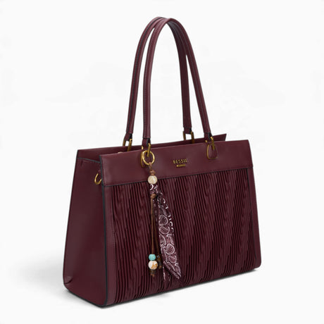 Wine woven wave panel shoulder bag, angled view showing the woven wave panel and scarf