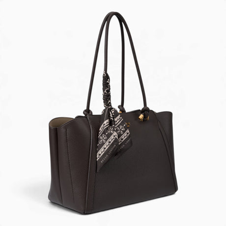 Coffee knot handle shoulder bag, angled view showing the knot handle detail
