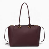 Wine knot handle shoulder bag from the back, showing the clean back panel