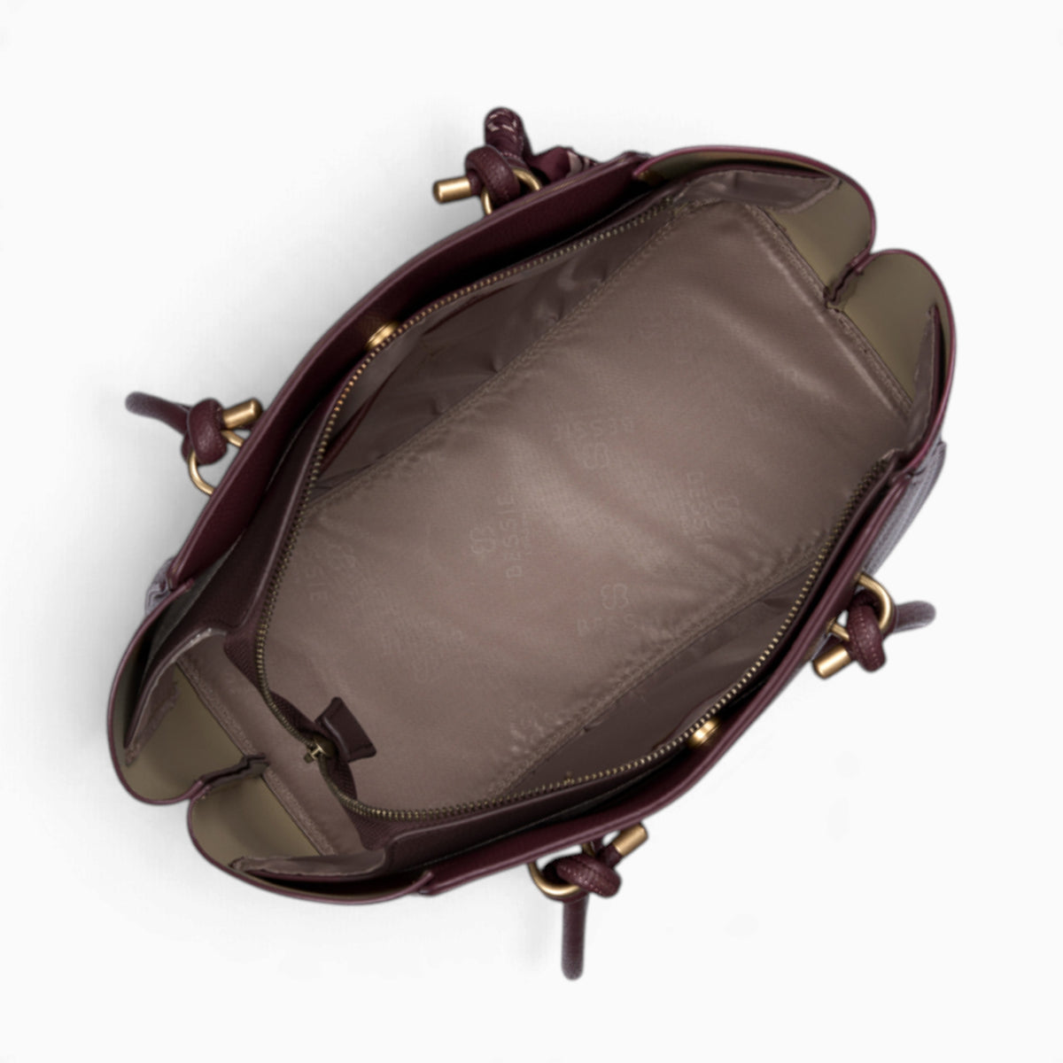 Wine knot handle shoulder bag opened to show the fully lined main compartment