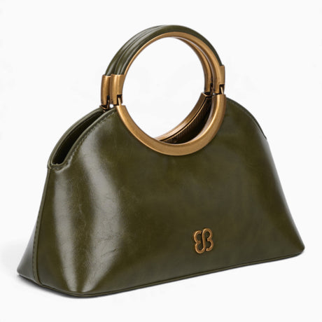 Green ring handle crossbody bag, angled view showing the sculptural ring handle