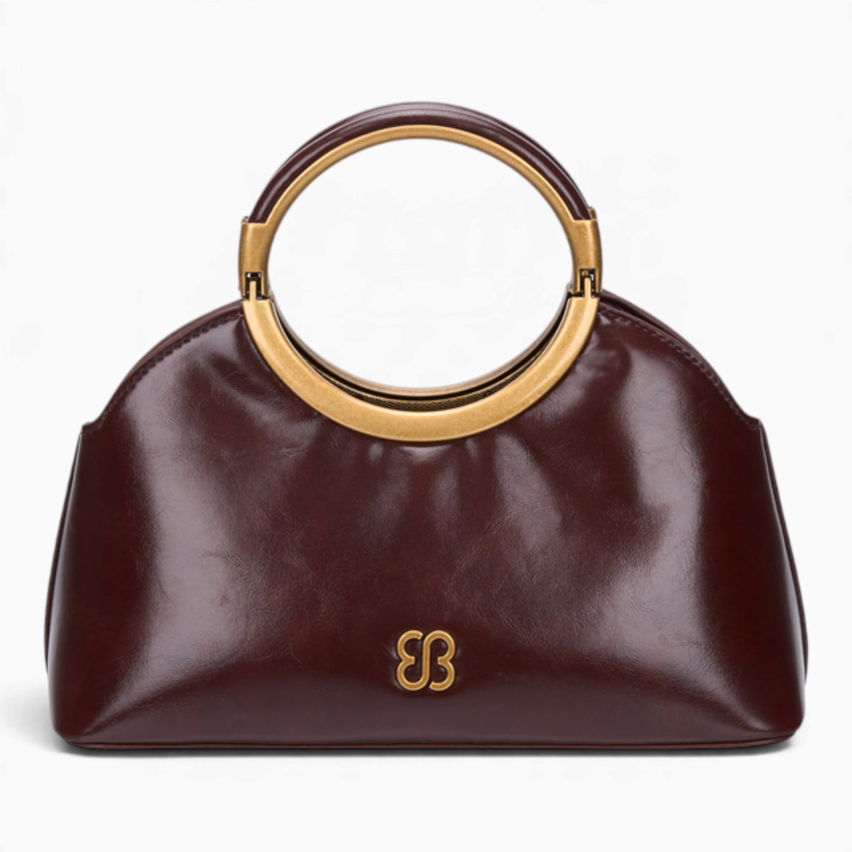 Coffee ring handle crossbody bag with a gold ring handle and rounded shape