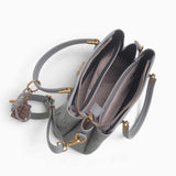 Grey small monogram tote bag opened to show the middle compartment divided into three