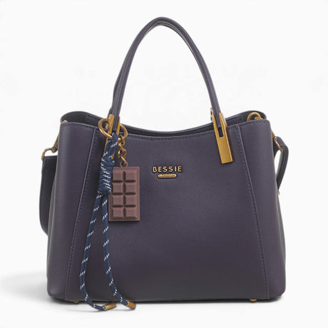 Purple faux leather tote bag with a chocolate bar charm