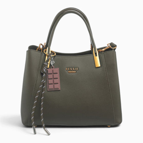 Dark green faux leather tote bag with a chocolate bar charm