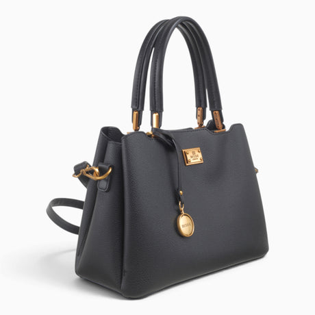 Black structured tote bag, angled view showing the structured shape and charm
