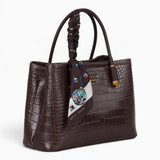 Coffee croc-effect tote bag, angled view showing the glossy croc-effect texture