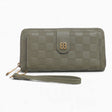Green checkerboard flap wallet with an embossed checkerboard and wrist strap