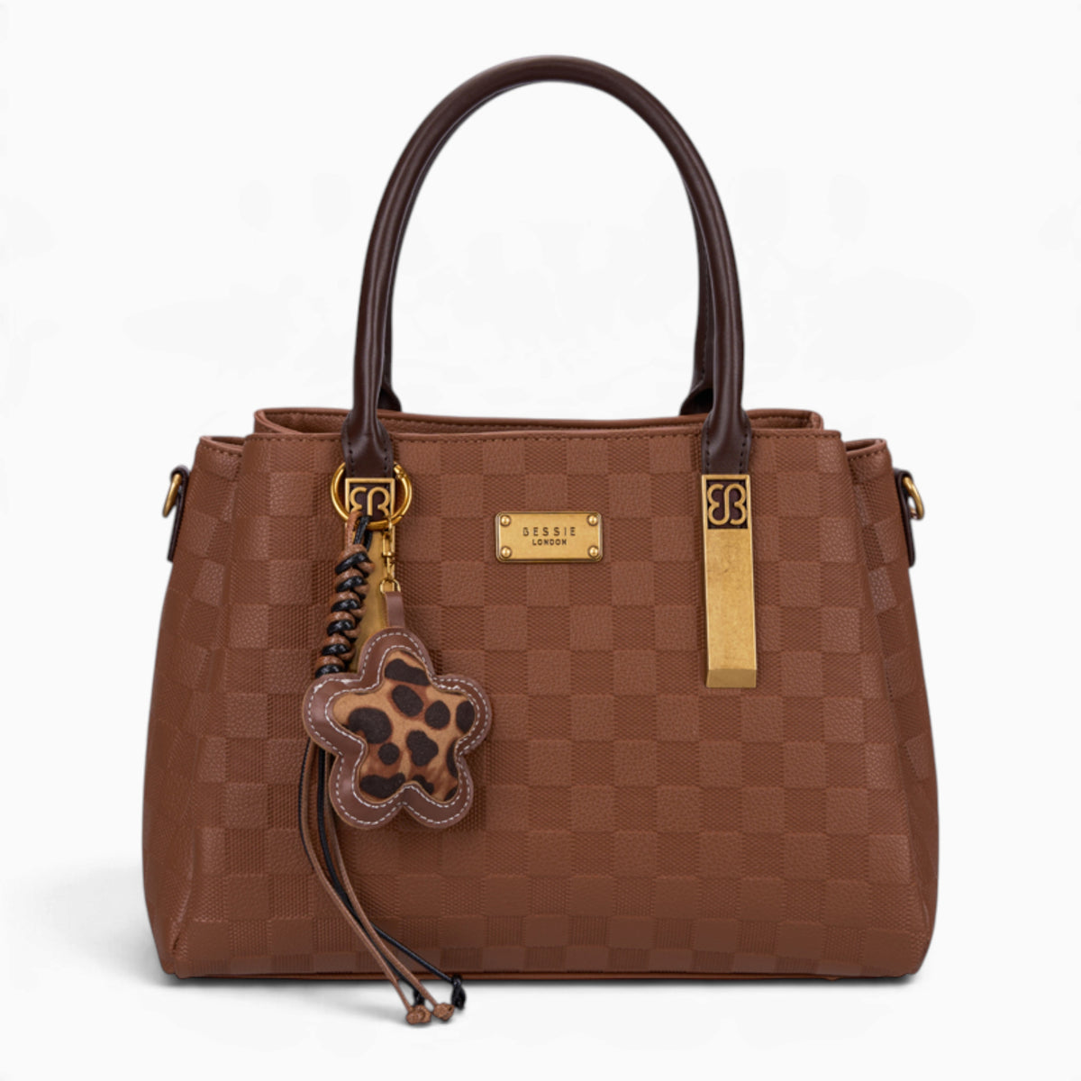 Tan checkerboard tote bag with a charm and gold-tone hardware