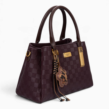 Wine checkerboard tote bag, angled view showing the checkerboard pattern and charm
