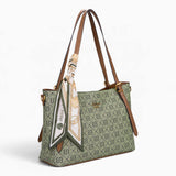 Grey monogram shoulder bag, angled view showing the monogram print and scarf