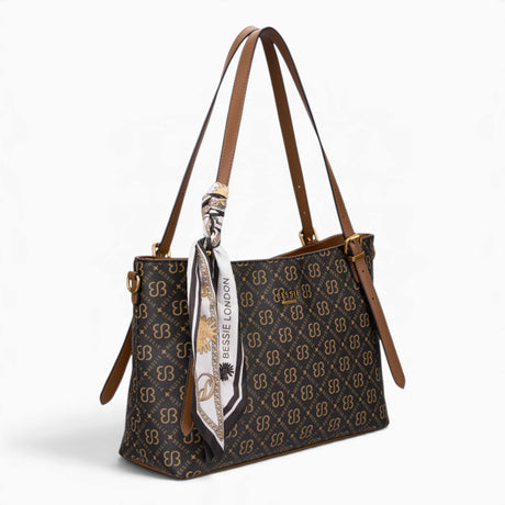Coffee monogram shoulder bag, angled view showing the monogram print and scarf