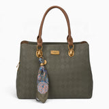 Green monogram tote bag with a printed scarf accent