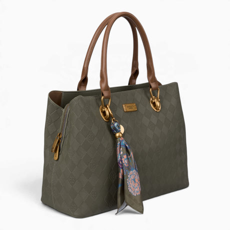 Green monogram tote bag, angled view showing the monogram print and scarf