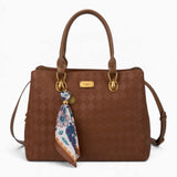 Tan monogram tote bag with a printed scarf accent