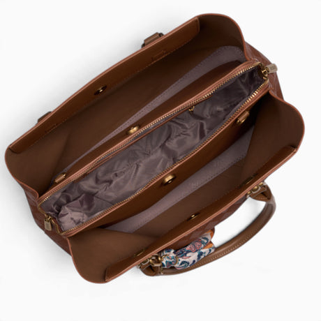 Tan monogram tote bag opened to show the three compartments with a middle zip