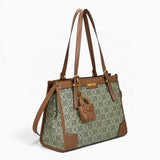 Grey monogram shoulder bag, angled view showing the monogram print and charm
