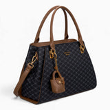 Black sculpted monogram tote bag, angled view showing the sculpted shape and charm