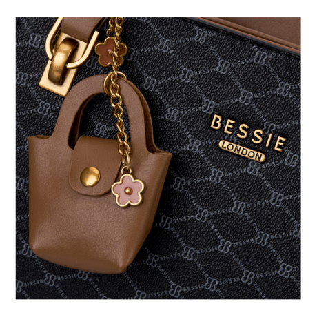 Black sculpted monogram tote bag, close-up of the mini bag charm and monogram print