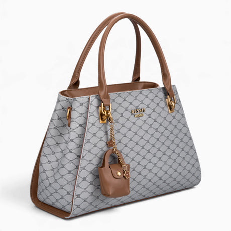 Grey sculpted monogram tote bag, angled view showing the sculpted shape and charm
