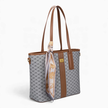 Grey monogram shopper bag, angled view showing the monogram print and scarf