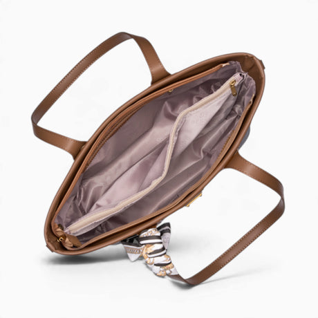 Coffee monogram shopper bag opened to show the zipped divider compartment