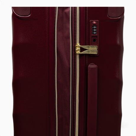 Burgundy Dusk Sahara suitcase, close-up of the expansion zip