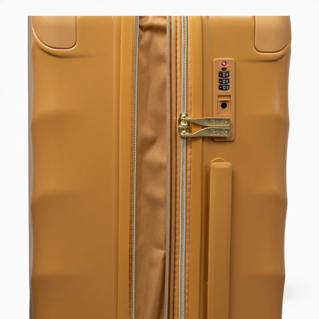 Gold Sunset Sahara suitcase, close-up of the expansion zip