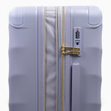 Lilac Sunrise Sahara suitcase, close-up of the expansion zip