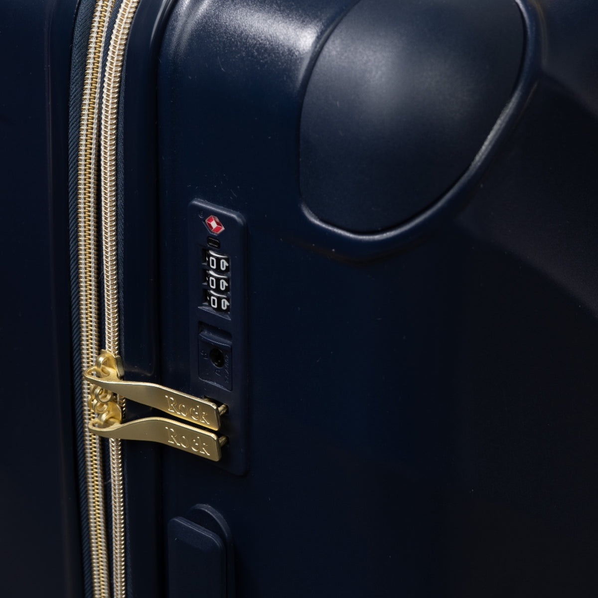 Midnight Navy Sahara suitcase, close-up of the TSA combination lock