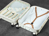 Vanilla Gelato suitcase opened to show the peach skin lining, wet pocket and packing straps