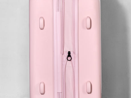 Strawberry Gelato suitcase, close-up of the expansion zip around the side