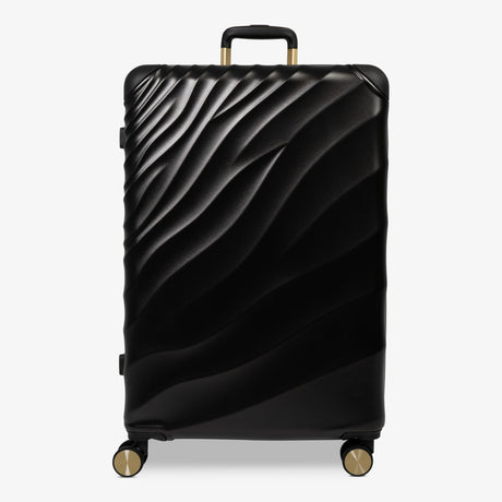 Moonlight Black Sahara large suitcase with a wave-design hard shell and 8 double spinner wheels