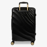 Moonlight Black Sahara medium suitcase from the back, showing the trolley handle and back panel