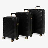 Moonlight Black Sahara suitcase set: cabin, medium and large cases standing together