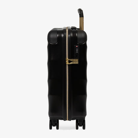 Moonlight Black Sahara cabin suitcase, side view showing the side handle and reinforced corners