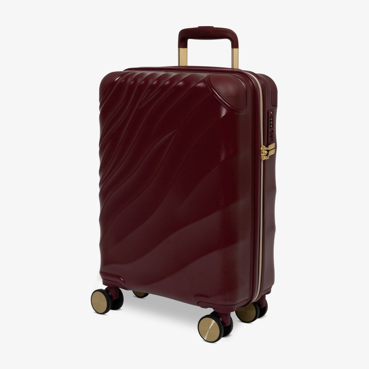 Burgundy Dusk Sahara cabin suitcase, angled view showing the wave-design shell