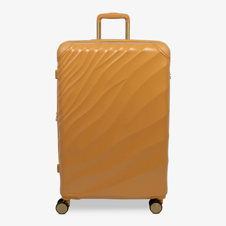 Gold Sunset Sahara large suitcase with a wave-design hard shell and 8 double spinner wheels