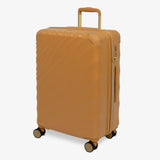 Gold Sunset Sahara medium suitcase, angled view showing the wave-design shell